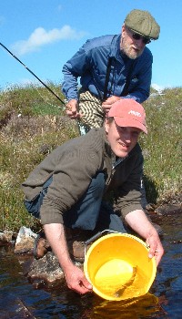 Dugie Foreman returns a wildtrout to a hill loch above Loch Maree